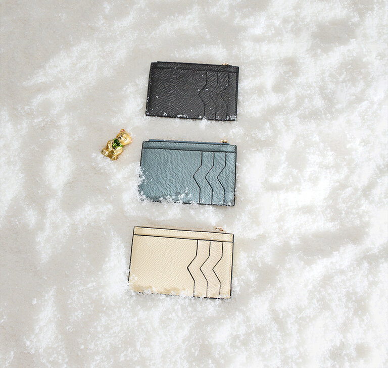 Valextra leather card cases in white and blue color