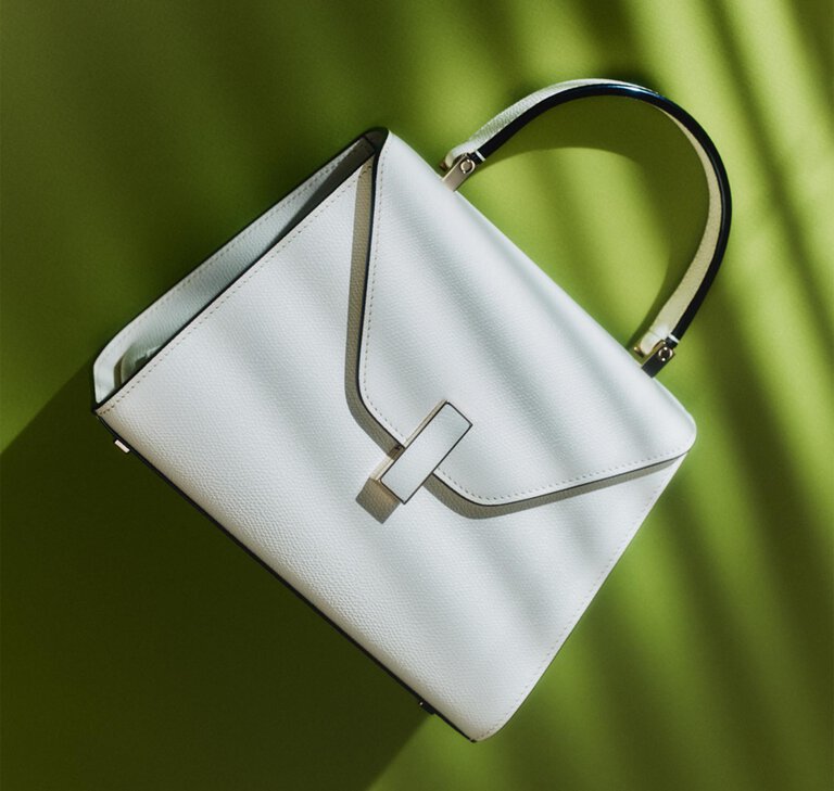 Valextra, Iside trapezoid bag with flap in calf leather white