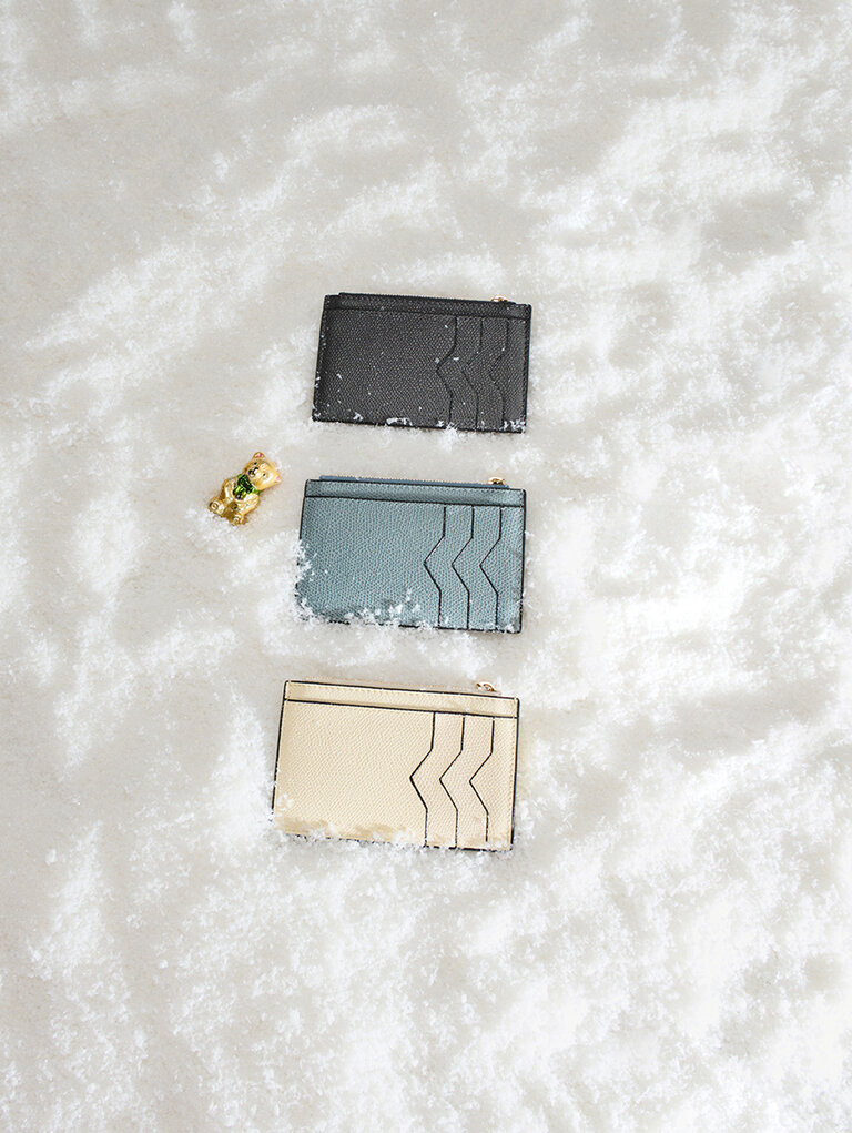 Valextra leather card cases in white and blue color