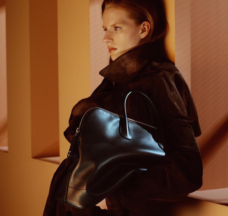 Valextra My Logo Bowling black leather handbag, a minimalist Italian luxury handbag crafted for everyday wear, work and travel.