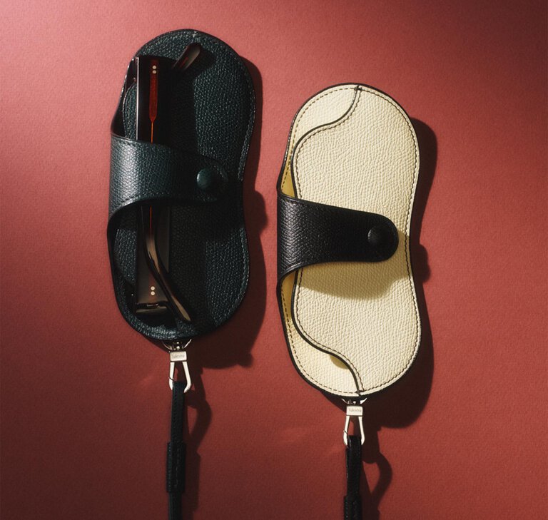 Valextra, leather sun glassses case in black and white leather