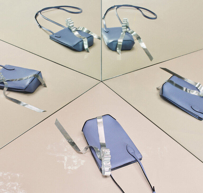 alextra - Vivi Phone Pouch crossbody in light blue white Millepunte leather