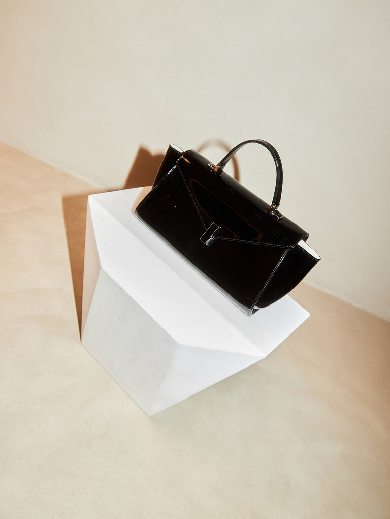 Valextra Iside editor front flap bag in shiny black leather