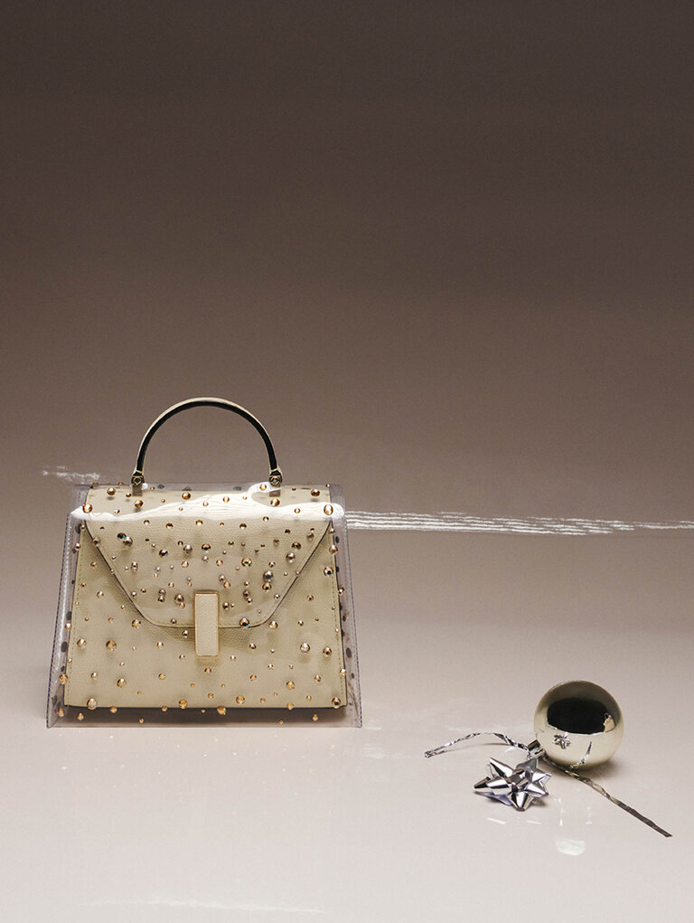 Valextra Iside top handle Bag in white Pergamena with rhinestone raincoat