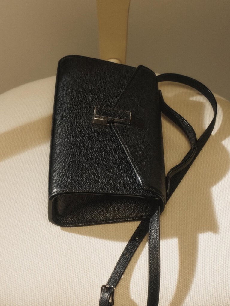 Valextra, Iside Tin front flap small bag in black leather