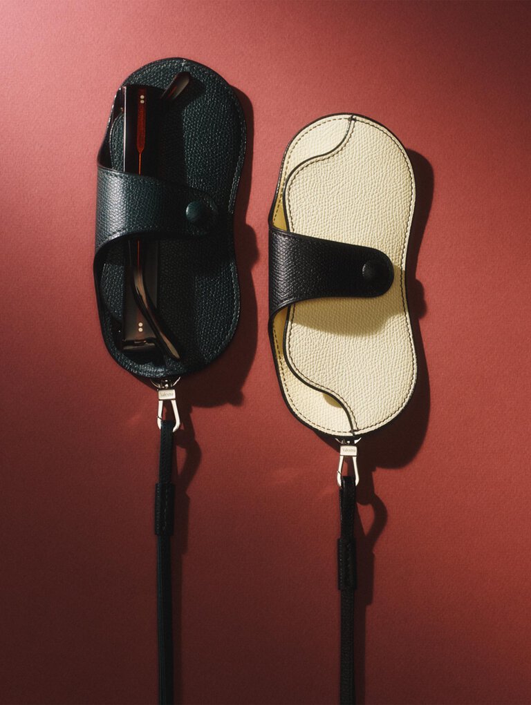 Valextra, leather sun glassses case in black and white leather