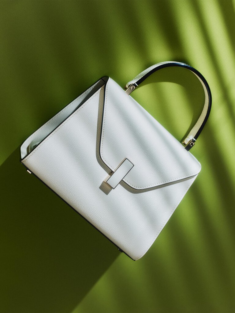 Valextra, Iside trapezoid bag with flap in calf leather white
