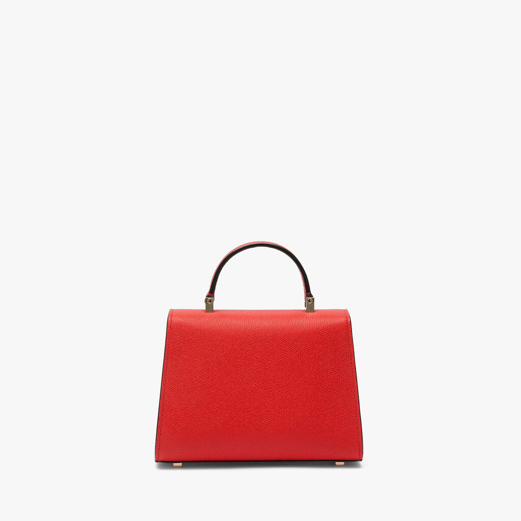 Red Hammered leather Micro top handle bag | Valextra Iside